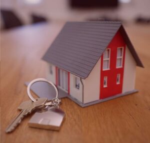 House figurine with keys