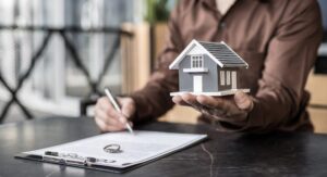 Woman signing contract for a home